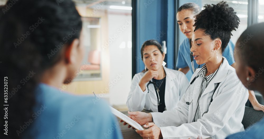 Doctors, nurse and women on clipboard in meeting, collaboration or teamwork for hospital planning, medical or life insurance. Talking, leadership and healthcare workers on paper in diversity research