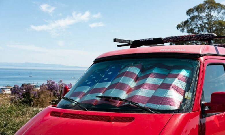 red car with white and black checkered textile on top