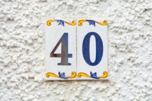 A close up of a number on a wall