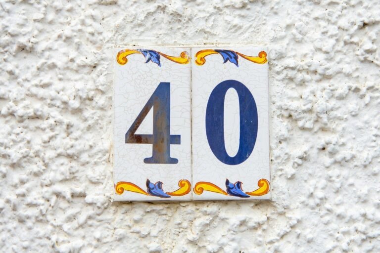 A close up of a number on a wall