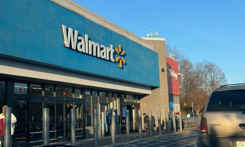 a walmart store with a car parked in front of it