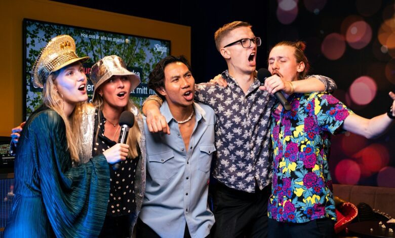 A group of people standing next to each other